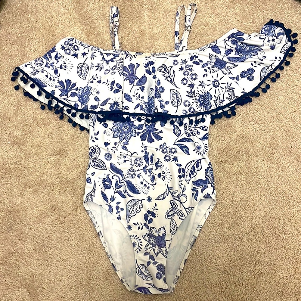 This swimsuit was only worn once, and got to small. Enjoy!